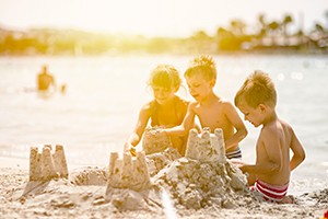 kids building a sandcastle