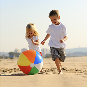 kids playing with beach ball