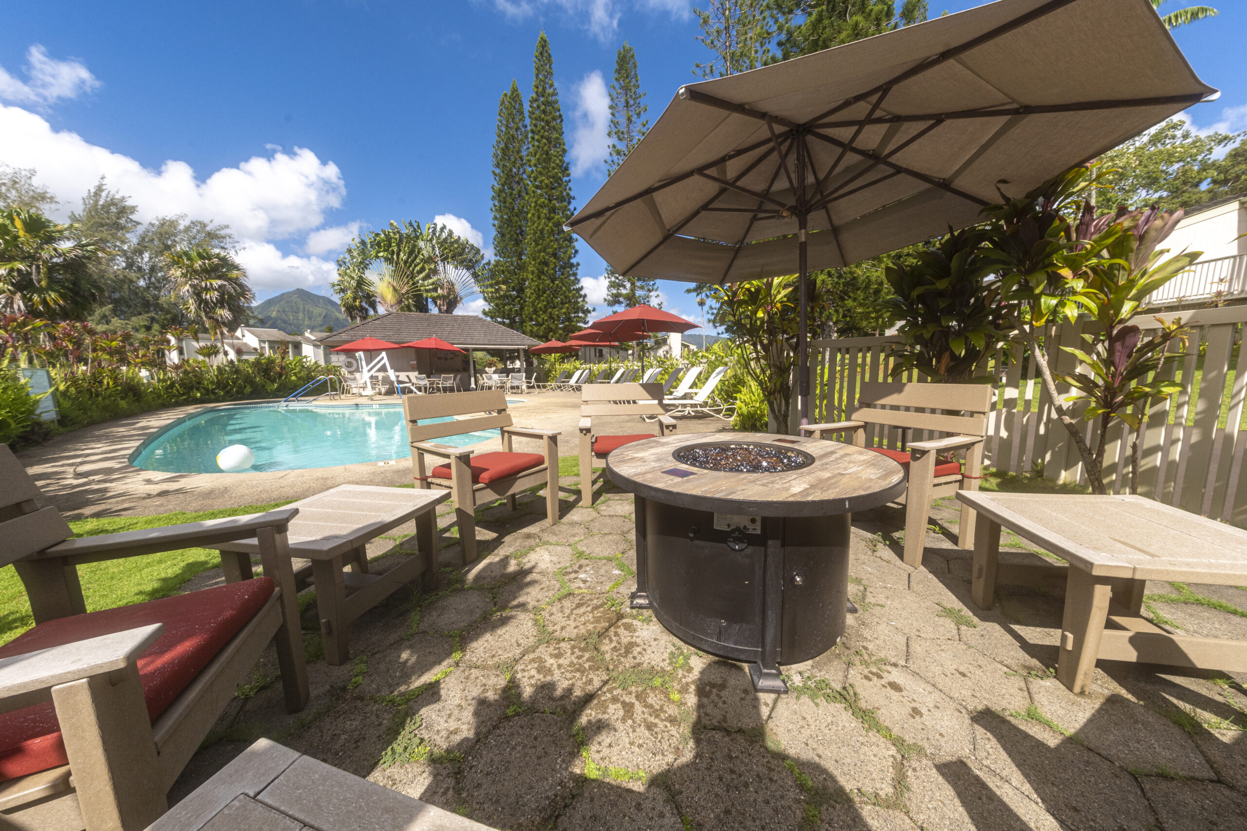 makai club resort photo of exterior fire pits and pool area