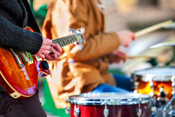 band playing guitar and drums close up