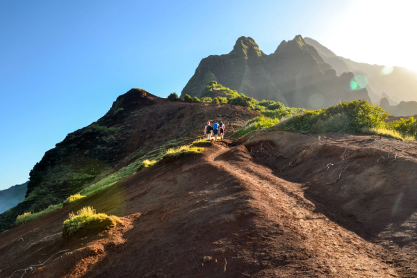 hikers in kauai on the kalalau trail